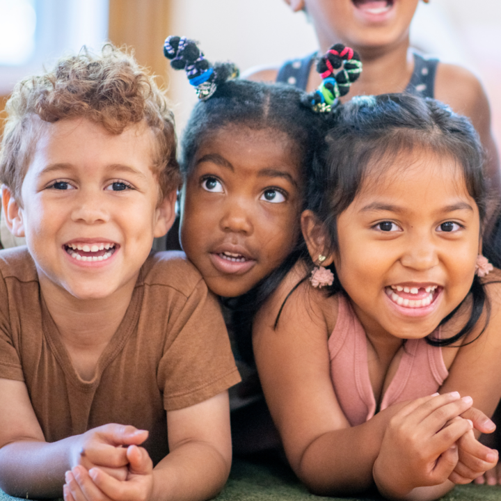 3 children laughing together